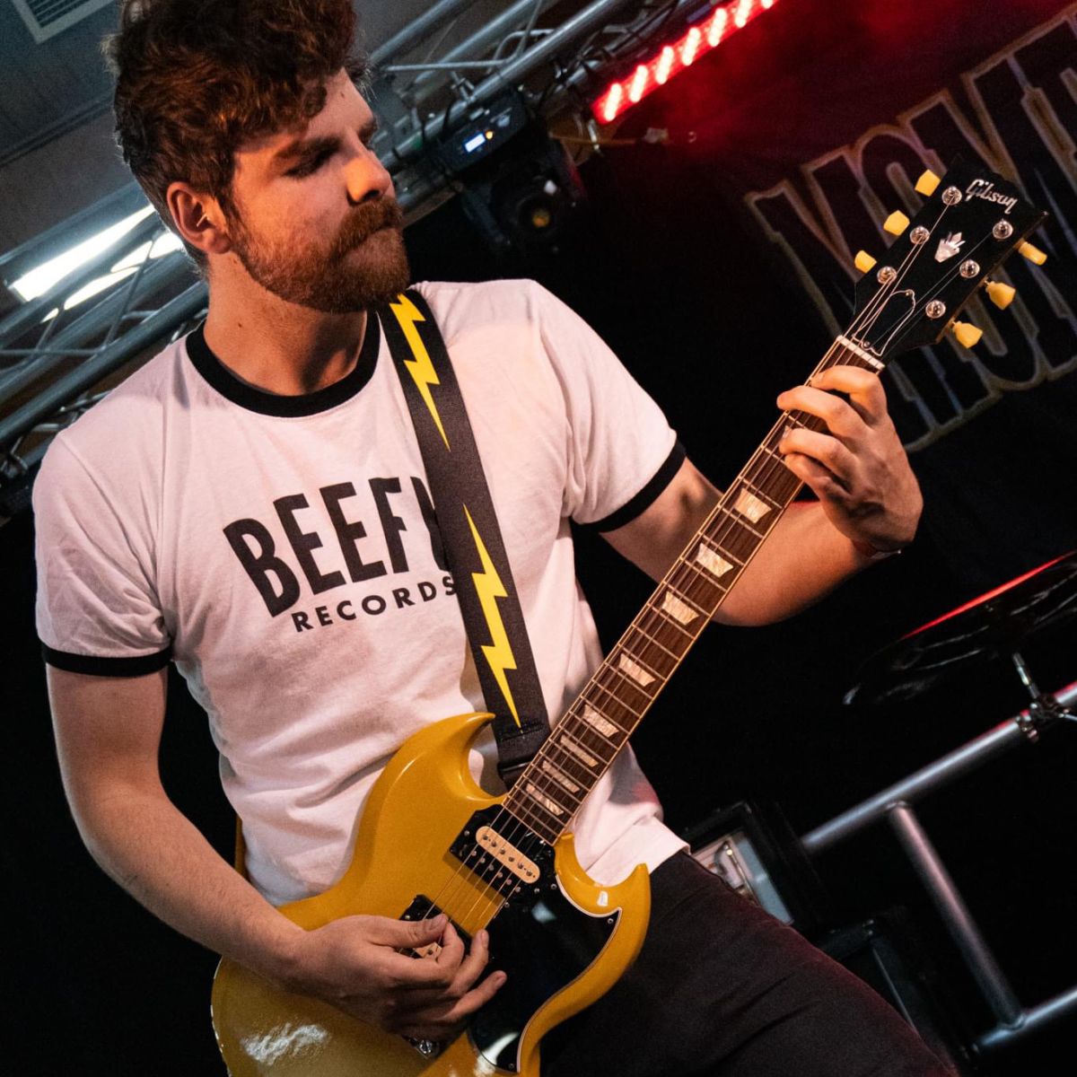 Swade playing guitar